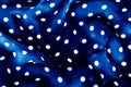 Classic polka dot textile background texture, white dots on blue luxury fabric design pattern Royalty Free Stock Photo