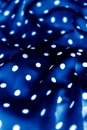 Classic polka dot textile background texture, white dots on blue luxury fabric design pattern Royalty Free Stock Photo