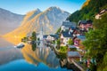 Hallstatt with ship at sunrise, Salzkammergut, Austria