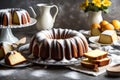 A classic pound cake, baked to perfection in a bundt pan, showcasing its traditional vanilla or sour cream flavor and delicately Royalty Free Stock Photo