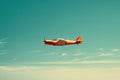 Classic Propeller Plane Flying in Blue Sky. Royalty Free Stock Photo