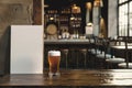 Classic Pub Interior with Pint of Beer on Wooden Bar and Blank Frame Royalty Free Stock Photo