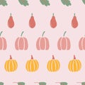 Classic pumpkins, pears and leaves in rows seamless pattern. Hand-drawn pumpkins of different shapes in on a soft pink