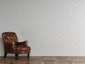 Classic red brown leather armchair standing in front of white brick wall with copy space Royalty Free Stock Photo