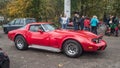 Classic red Chevrolet Corvette muscle car driving Royalty Free Stock Photo