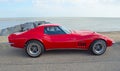 Classic Red Chevrolet Corvette Stingray Motor Car Parked on Seafront Promenade. Royalty Free Stock Photo