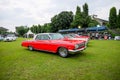 Classic red Chevrolet Impala sedan in outdoor car show Royalty Free Stock Photo
