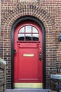 Red door of a house in Brooklyn in New York City, USA Royalty Free Stock Photo