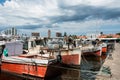 Classic Red Fishing Boats moored in front of the yachts Royalty Free Stock Photo