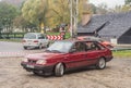 Classic Polish old red private car Polonez Caro driving