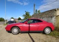 Classic red sport car Alfa Romeo T.Spark Gio parked front left side view Royalty Free Stock Photo