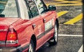 Classic Red Taxi Cab of Hong Kong Royalty Free Stock Photo