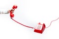 Classic red telephone receiver in hand Royalty Free Stock Photo