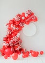 Classic red and white Christmas party decorations with helium balloons. Christmas mockup. Happy new year photo session decor idea Royalty Free Stock Photo