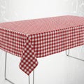 Classic red and white gingham patterned tablecloth draped over a table Royalty Free Stock Photo