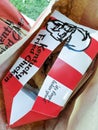 Classic red and white stripes of Kentucky Fried Chicken packaging