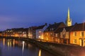 Old cottages from Norwich reflected in river Burr in late evening light Royalty Free Stock Photo