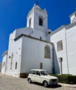 Classic Renault under St Mary's Church in Tavira, Portugal