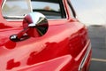 Classic retro beautiful red car. Close up mirror Royalty Free Stock Photo