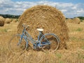 Classic retro bike with hay bales Royalty Free Stock Photo