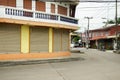 Classic retro commercial building and house in small alley