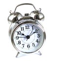 Classic retro style alarm clock with bells and hammer isolated against a white background Royalty Free Stock Photo