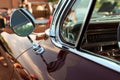 Classic retro vintage black car. Car mirror. The car is older than 1985 Royalty Free Stock Photo