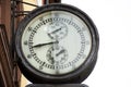 Classic retro vintage metal clock hanging on front of building in Heidelberg, Germany Royalty Free Stock Photo