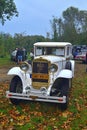 Classic retro vintage veteran prewar white elegant big car CWS-T during car show