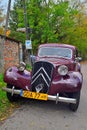 Classic retro old vintage veteran purple red French car Citroen 15 Traction Avant during car show
