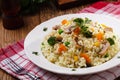 Classic Risotto with mushrooms and vegetables served on a white plate Royalty Free Stock Photo