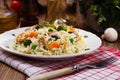 Classic Risotto with mushrooms and vegetables served on a white plate Royalty Free Stock Photo