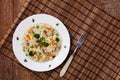 Classic Risotto with mushrooms and vegetables served on a white plate Royalty Free Stock Photo