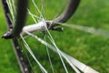 Classic road bicycle close-up photo in the summer green grass meadow field. Travel background Royalty Free Stock Photo