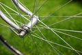 Classic road bicycle close-up photo in the summer green grass meadow field. Travel background Royalty Free Stock Photo
