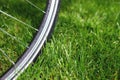 Classic road bicycle close-up photo in the summer green grass meadow field. Travel background Royalty Free Stock Photo