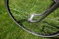 Classic road bicycle close-up photo in the summer green grass meadow field. Travel background Royalty Free Stock Photo