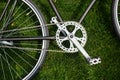 Classic road bicycle close-up photo in the summer green grass meadow field. Travel background Royalty Free Stock Photo