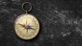 Classic round compass on stone vintage background