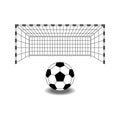 Classic round soccer ball in front of soccer goal