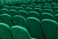 Classic rows of empty green seats in the theater. Hall without visitors. Royalty Free Stock Photo