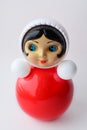 Classic Russian red toy `Nevalyashka` - roly-poly on the white, retro Royalty Free Stock Photo