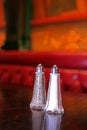 Classic Salt and Pepper Shakers in a Restaurant Royalty Free Stock Photo