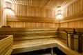 Classic sauna interior in Russia. Beautiful and clean wooden sauna. Modern nice bathroom for hot spa treatments