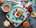 Classic scones with clotted cream, strawberries jam, english Tea and other fruit Royalty Free Stock Photo