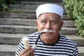 Classic senior sailor with a mustache Royalty Free Stock Photo