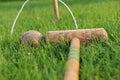 Classic set of vintage cricket stumps and bails and goals. Old wooden stick and devastate red ball. Game for all members of family