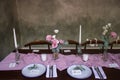 Classic setting traditional fine dining table elegant luxury style with silverware, wine glass, flower on special occasion date