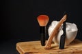 Classic Shaving Equipment With Razor, Brush, and Soap on Wooden Stand Against Dark Background Royalty Free Stock Photo