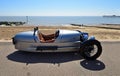 Classic Silver Morgan 3 wheeled Motor Car Parked on Seafront Promenade.